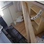 熊本地震の倒壊木造家屋の内部を再現した瓦礫空間に能動スコープカメラの進入させている様子（画像はプレスリリースより）