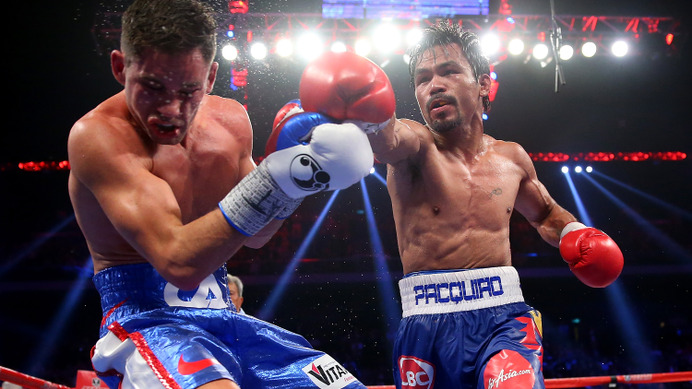 ボクシングWBO世界ウェルター級タイトルマッチ、王者マニー・パッキャオ（フィリピン）、挑戦者クリス・アルジェリ（米国）（2014年11月23日）（c）Getty Images