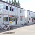 岩手県宮古市田老地区の仮設住宅や店舗。4年を経ても、まだ半分程度が埋まっている