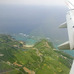 宮古空港に着陸する旅客機のなかから宮古島を見下ろす